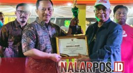 Foto. Kepala Bappeda Sumenep Dr Ir Arif Firmanto, S.TP., M.Si.IPU.ASEAN Eng saat menerima penghargaan sebagai Stan terbaik di malam penutupan MNV 2025