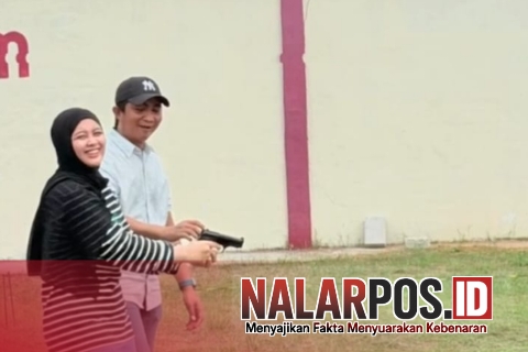 Foto. H. Syafwan wahyudi atau akrab disapa H Udik Pimpinan DRT The Big Family saat bersama Istri di Lapangan Tembak Perbakin Shooting Polres Sumenep
